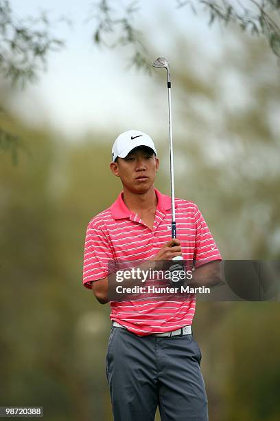 Anthony Kim watches his shot during the second round of the Waste Management Phoenix Open at TPC Scottsdale on February 26, 2010 in Scottsdale,...