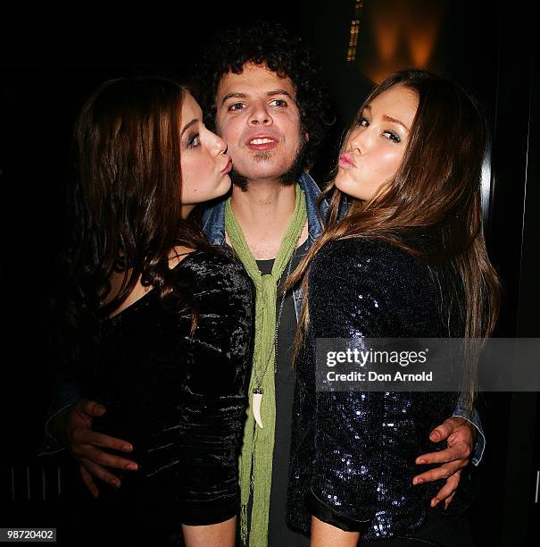 April Rose Pengilly, Andrew Stockdale and Erin McNaught pose at the after show party following the "MTV Classic: The Launch" music event, at the...