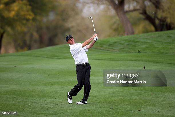 Jonathan Kaye hits his shot during the second round of the Waste Management Phoenix Open at TPC Scottsdale on February 26, 2010 in Scottsdale,...