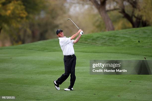 Jonathan Kaye hits his shot during the second round of the Waste Management Phoenix Open at TPC Scottsdale on February 26, 2010 in Scottsdale,...