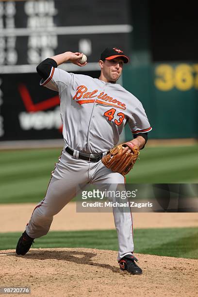 Jim Johnson of the Baltimore Orioles pitching during the game against the Oakland Athletics at the Oakland Coliseum in Oakland, California on April...