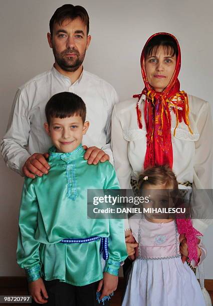 Isabelle WESSELINGH Lipovan family, Ana Makarov Vladimir , his wife Olimpia , son Andrei and daughter Ana Makarov pose at the house in Tulcea, 270km...