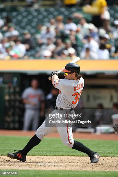 Luke Scott of the Baltimore Orioles hitting during the game against the Oakland Athletics at the Oakland Coliseum in Oakland, California on April 17,...