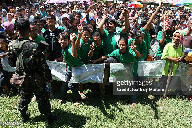 Supporters of Buluan Vice Mayor and candidate for governor of Maguindanao Esmael "Toto" Mangudadatu, attend a campaign rally on April 28, 2010 in the...