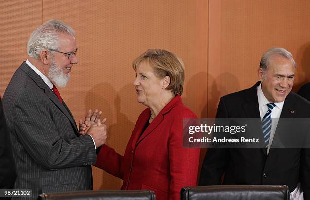 German Chancellor Angela Merkel welcomes Juan Somavia , director general of the International Labour Organization as Secretary General of...