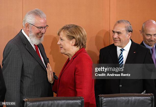 German Chancellor Angela Merkel welcomes Juan Somavia , director general of the International Labour Organization as Secretary General of...