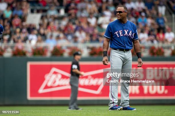 Adrian Beltre of the Texas Rangers looks on against the Minnesota Twins on June 24, 2018 at Target Field in Minneapolis, Minnesota. The Twins...