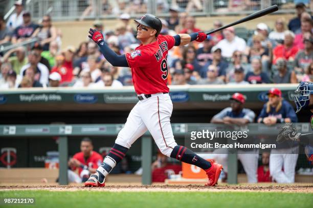 Logan Morrison of the Minnesota Twins bats against the Texas Rangers on June 24, 2018 at Target Field in Minneapolis, Minnesota. The Twins defeated...