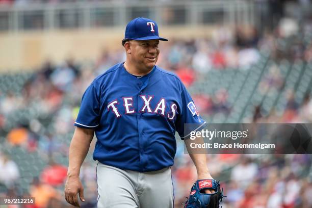 Bartolo Colon of the Texas Rangers looks on against the Minnesota Twins on June 24, 2018 at Target Field in Minneapolis, Minnesota. The Twins...