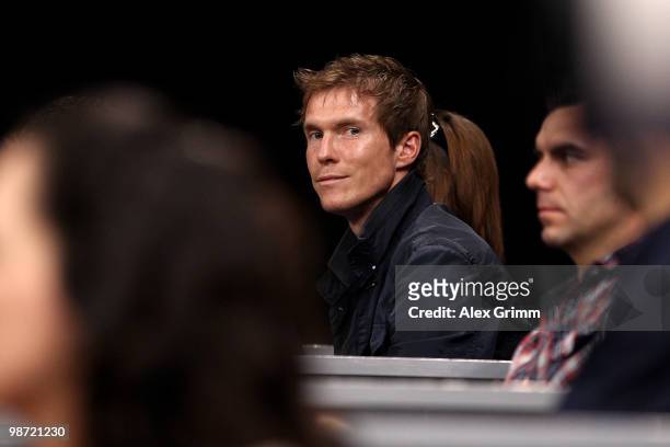 Aliaksandr Hleb of VfB Stuttgart watches the first round match between Victoria Azarenka of Belarus and Flavia Pennetta of Italy at day three of the...