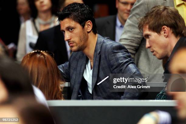 Aliaksandr Hleb and Ciprian Marica of VfB Stuttgart watches the first round match between Victoria Azarenka of Belarus and Flavia Pennetta of Italy...