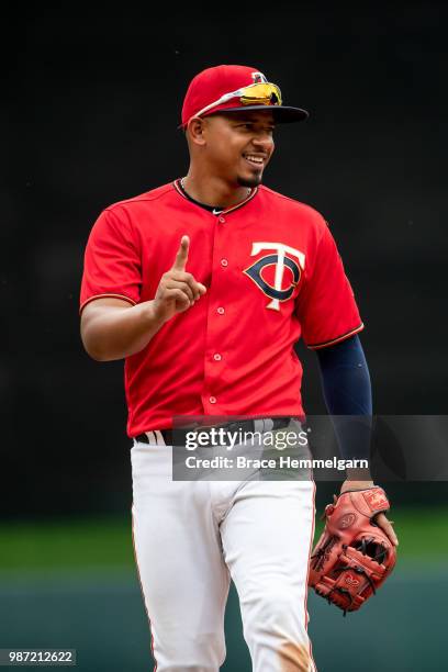 Eduardo Escobar of the Minnesota Twins looks on against the Texas Rangers on June 24, 2018 at Target Field in Minneapolis, Minnesota. The Twins...