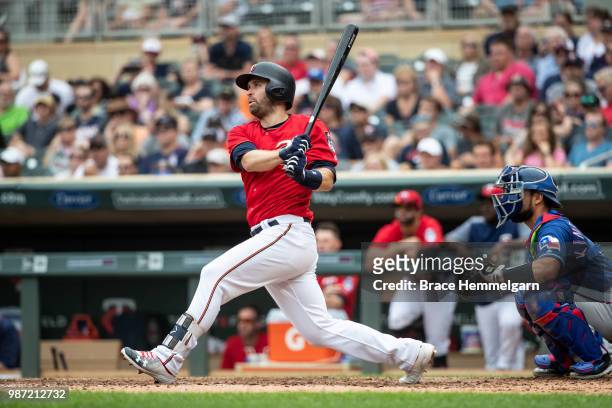 Brian Dozier of the Minnesota Twins bats against the Texas Rangers on June 24, 2018 at Target Field in Minneapolis, Minnesota. The Twins defeated the...