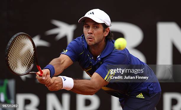 Fernando Verdasco of Spain plays a backhand in his match against Simone Bolelli of Italy during day four of the ATP Masters Series - Rome at the Foro...