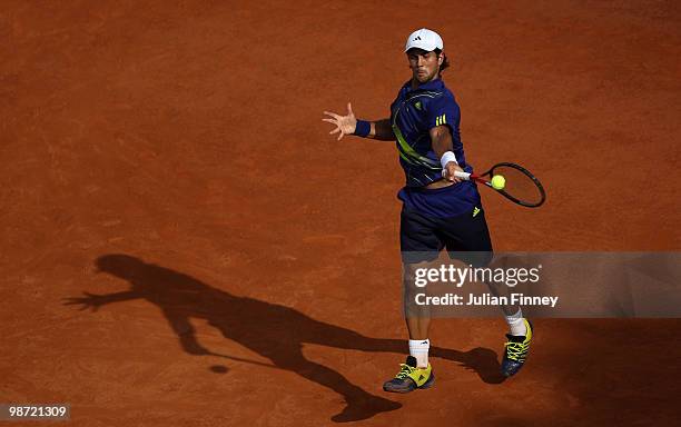 Fernando Verdasco of Spain plays a forehand in his match against Simone Bolelli of Italy during day four of the ATP Masters Series - Rome at the Foro...