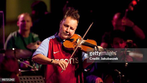 Violinist Nigel Kennedy performs live during a concert rehearsal at the Philharmonie on April 28, 2010 in Berlin, Germany. The sold out concert is...