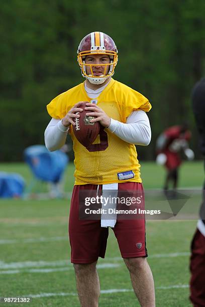 Quarterback Rex Grossman of the Washington Redskins sets up to throw a pass during a mini camp on April 18, 2010 at Redskins Park in Ashburn,...
