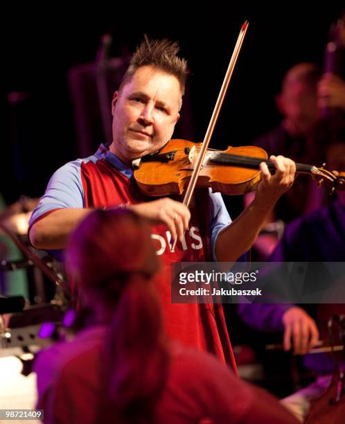 Violinist Nigel Kennedy performs live during a concert rehearsal at the Philharmonie on April 28, 2010 in Berlin, Germany. The sold out concert is...