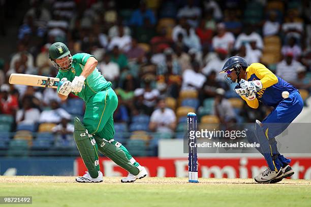Mark Boucher of South Africa plays to the legside as Kumar Sangakkara looks on during The ICC T20 World Cup warm up match between Sri Lanka and South...