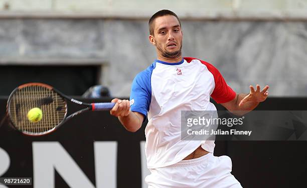 Viktor Troicki of Serbia plays a forehand in his match against Jo-Wilfried Tsonga of France during day four of the ATP Masters Series - Rome at the...