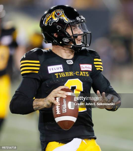 Johnny Manziel of the Hamilton Tiger-Cats looks to pass against the Toronto Argonauts during a pre-season game at Tim Hortons Field on June 1, 2018...