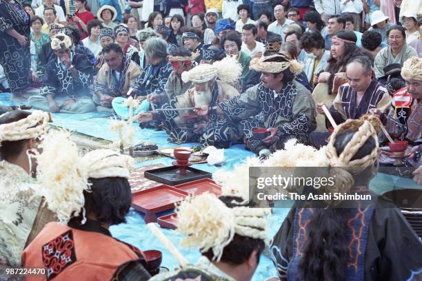 Ainu people hold an 'Ashiricheppunomi' ceremony to welcome new salmon season at Toyohiragawa River on September 15, 1987 in Sapporo, Hokkaido, Japan.