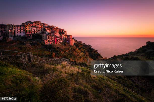 corniglia sunset (cinque terre) - corniglia stock pictures, royalty-free photos & images