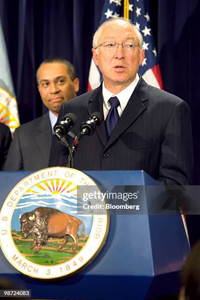 Ken Salazar, U.S. Secretary of the interior, speaks at a news conference as Patrick Deval, governor of Massachusetts, listens at left, in Boston,...