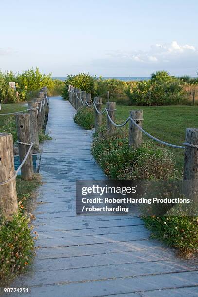 path to beach, sanibel island, gulf coast, florida, united states of america, north america - north texas v florida atlantic stock pictures, royalty-free photos & images