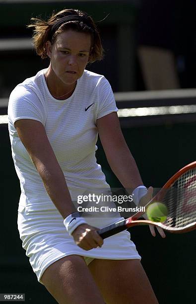 Lindsey Davenport of the USA on her way to victory over Martina Sucha of Slovak Republic during the women's first round of The All England Lawn...