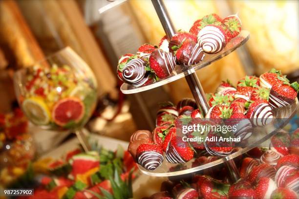 fruit platter, chocolate & strawberries - chocolate fondue stock pictures, royalty-free photos & images