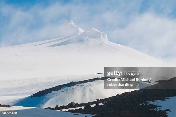 the snowcapped summit of the snaefellsjokull national park, iceland, polar regions - snaefellsjokull stock pictures, royalty-free photos & images