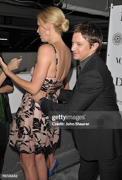 Actress Charlize Theron and actor Jeremy Renner arrive to the Charlize Theron Africa Outreach Project Dinner hosted by Dior and Vogue at Soho House...