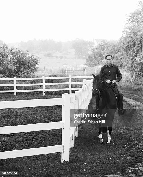 Former Governor of Massachusetts and politician, Mitt Romney riding one of his horses at a portrait session for Newsweek Magazine in Massachusetts in...