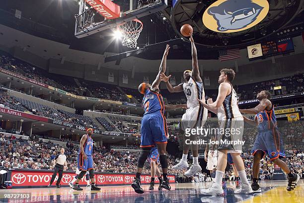 Zach Randolph of the Memphis Grizzlies puts a shot up against Al Harrington of the New York Knicks on March 12, 2010 at FedExForum in Memphis,...