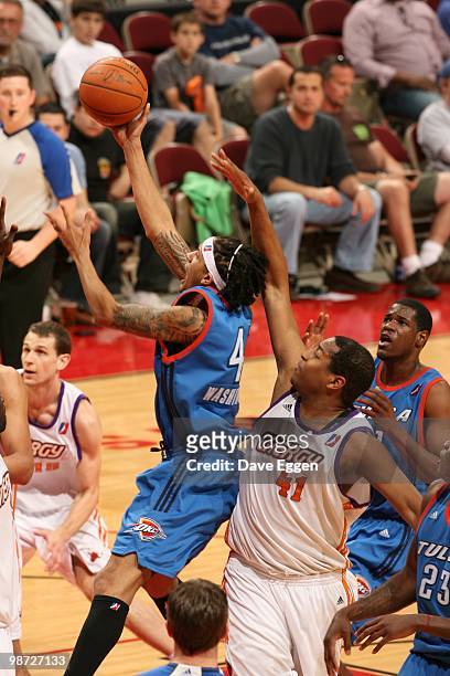 Deron Washington of the Tulsa 66ers lays up a shot past Darian Townes of the Iowa Energy in Game Two of the Semifinal seriesof the D-League playoffs...