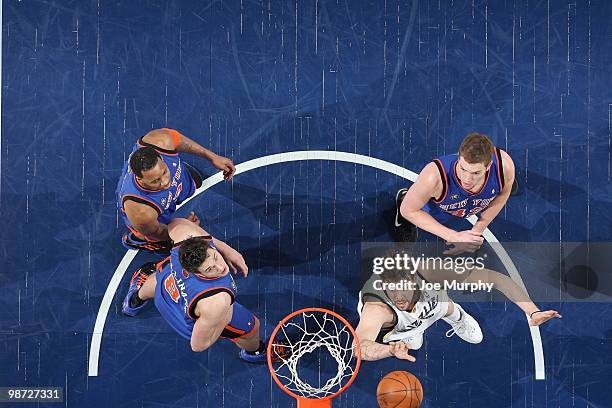 Marc Gasol of the Memphis Grizzlies puts a shot up against David Lee, Danilo Gallinari and Tracy McGrady of the New York Knicks on March 12, 2010 at...