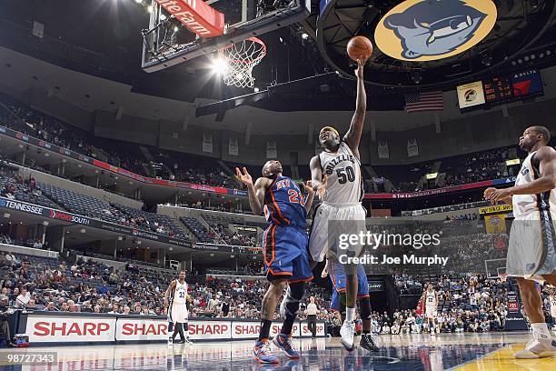 Zach Randolph of the Memphis Grizzlies puts a shot up against Wilson Chandler of the New York Knicks on March 12, 2010 at FedExForum in Memphis,...