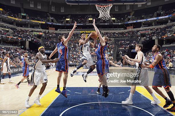Mike Conley of the Memphis Grizzlies puts a shot up against the New York Knicks on March 12, 2010 at FedExForum in Memphis, Tennessee. NOTE TO USER:...
