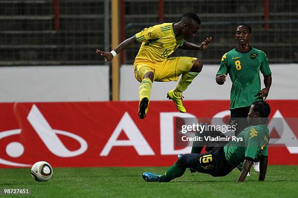 Nvian Boyd of Jamaica slides into Teko Modise of South Africa during the international friendly match between South Africa and Jamaica at Bieberer...