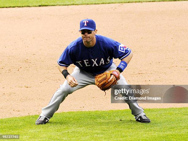 Third baseman Michael Young of the Texas Rangers waits for a pitch to be thrown during a game on April 12, 2010 against the Cleveland Indians at...