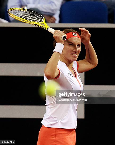 Svetlana Kuznetsova of Russia reacts during her second round match against Na Li of China at day three of the WTA Porsche Tennis Grand Prix...