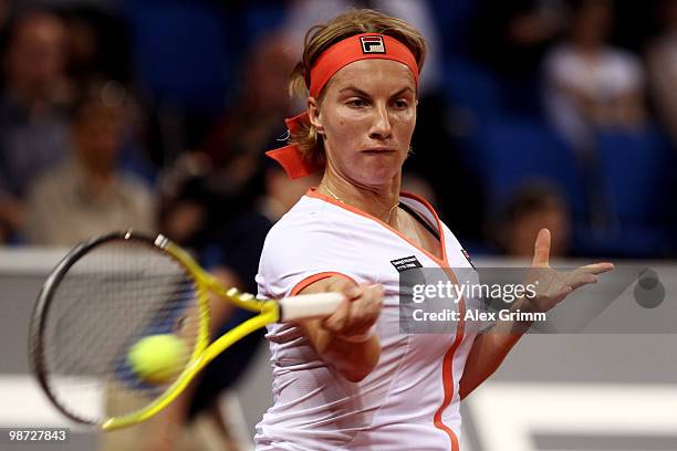 Svetlana Kuznetsova of Russia plays a forehand during her second round match against Na Li of China at day three of the WTA Porsche Tennis Grand Prix...