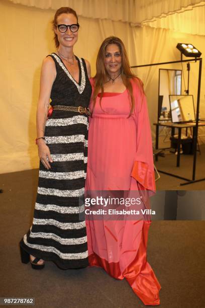 Jane Alexander and Paola Emilia Monachesi attend Sfilata AU197SM AltaRoma on June 29, 2018 in Rome, Italy.