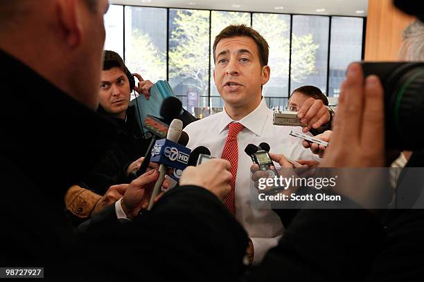 Senate candidate Alexi Giannoulias fields questions from reporters after being corralled in a post office as he left a rally at the Federal Building...