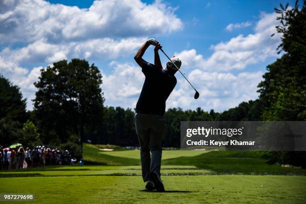 Marc Leishman of Australia tees off on the eighth hole during the second round of the Quicken Loans National at TPC Potomac at Avenel Farm on June...