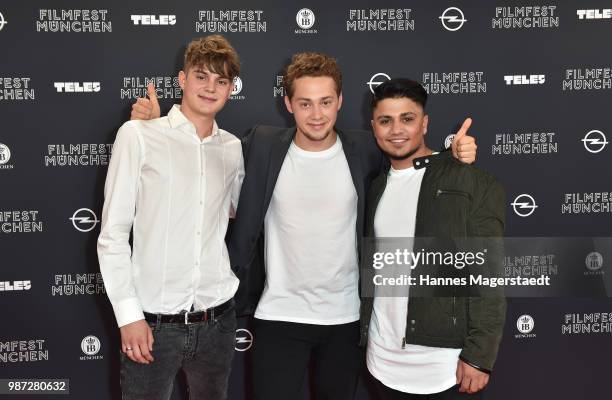 Leon Wulsch, Anselm Bresgott and Hussein Eliraqui attend the premiere of the movie 'Das schoenste Maedchen der Welt' of Munich Film Festival 2018 at...