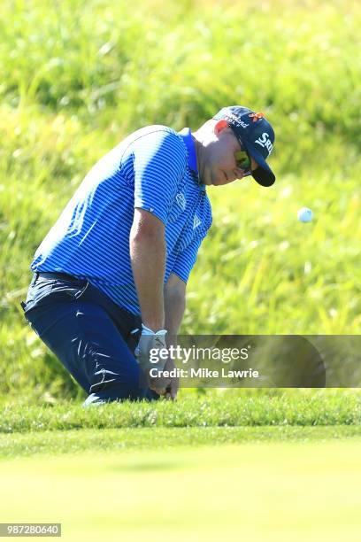 Ted Potter Jr. Plays a shot on to the 14th green during the second round of the Quicken Loans National at TPC Potomac on June 29, 2018 in Potomac,...