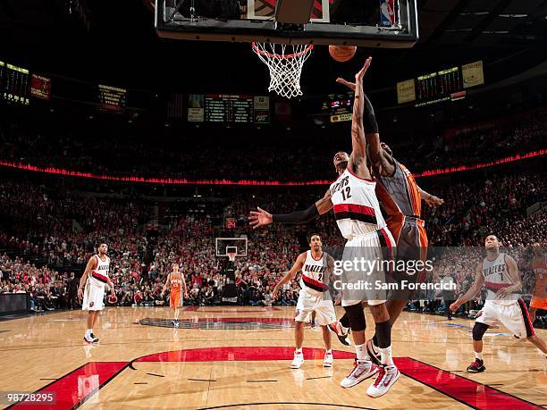 LaMarcus Aldridge of the Portland Trail Blazers shoots a layup against Amar'e Stoudemire of the Phoenix Suns in Game Four of the Western Conference...