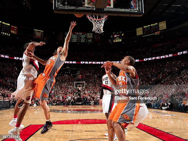 Steve Nash of the Phoenix Suns shoots a layup against Marcus Camby of the Portland Trail Blazers in Game Four of the Western Conference Quarterfinals...